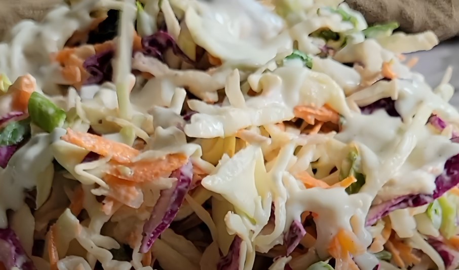 Close-up view of coleslaw dressed with yogurt