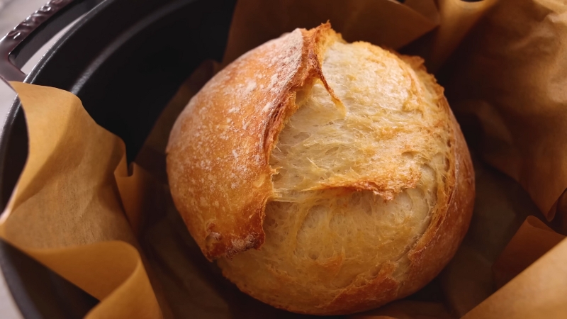A Freshly Baked Artisan Bread Loaf with A Golden, Crispy Crust