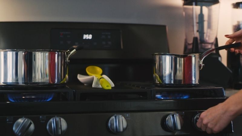 Cooking setup with pots on the stove
