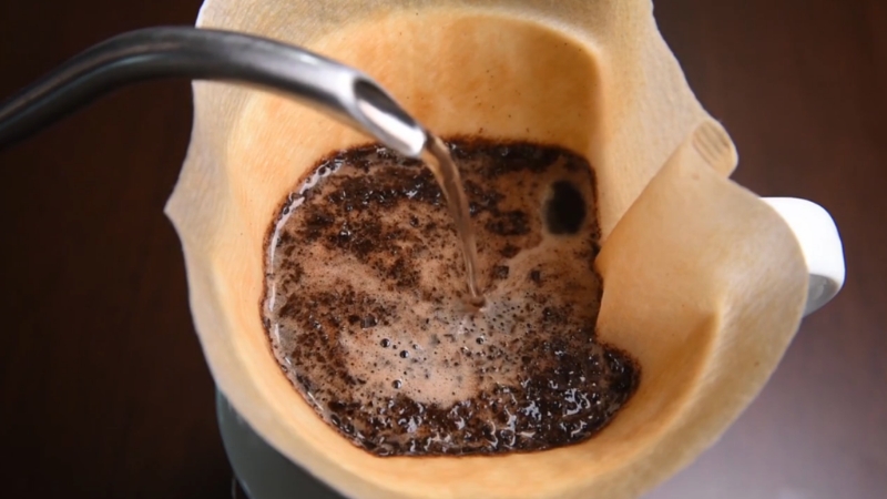 Pour-over coffee brewing shows how water quality directly affects flavor