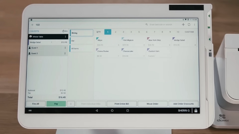 Clover POS screen showing table orders and menu items